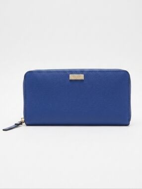 kate spade cobalt blue zip-around wallet with gold plaque